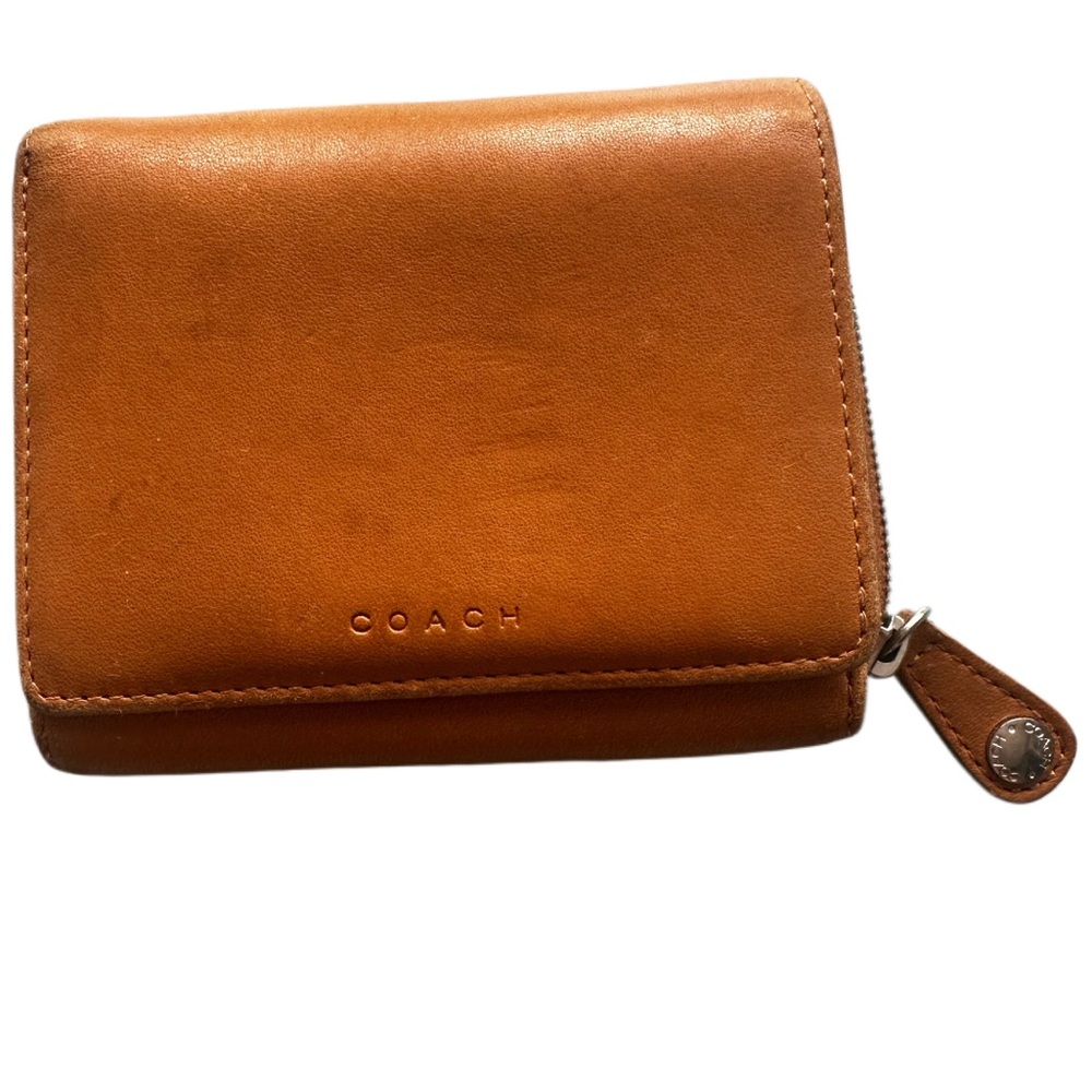 vintage Coach bifold leather wallet in a tan or camel color